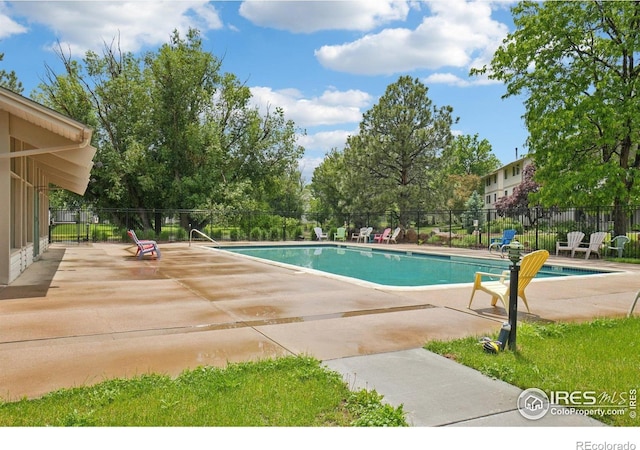 1705 Heatheridge Rd Unit G105, Fort Collins, CO 80526 - community pool featuring a patio area