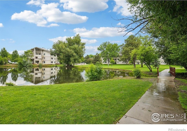 1705 Heatheridge Rd Unit G105, Fort Collins, CO 80526 - view of home's community featuring a water view and a lawn
