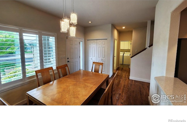 451 Clubhouse Ct, Loveland, CO 80537 - dining room featuring washing machine and clothes dryer, wood finished floors, baseboards, recessed lighting, and a chandelier