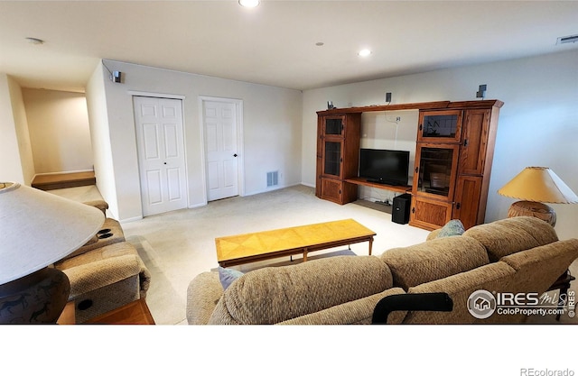 451 Clubhouse Ct, Loveland, CO 80537 - living area with recessed lighting, light colored carpet, and baseboards
