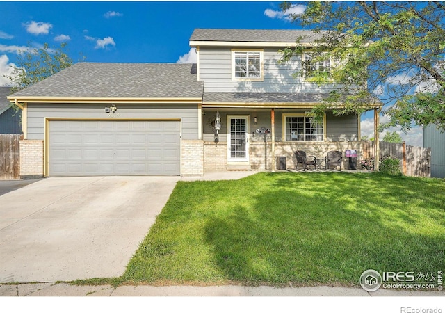 4314 Sunridge Dr, Loveland, CO 80538 - traditional home featuring brick siding, concrete driveway, a garage, and a shingled roof