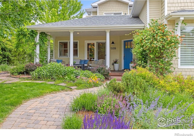 1509 Poplar Ave, Boulder, CO 80304 - view of front of house featuring a porch and a shingled roof