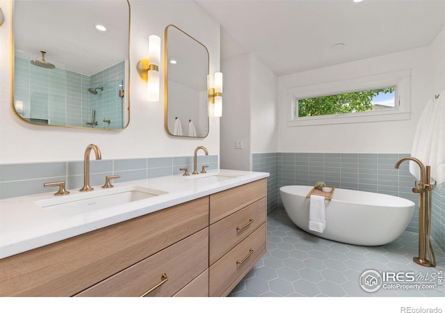 1509 Poplar Ave, Boulder, CO 80304 - bathroom with tile walls, double vanity, a tile shower, a soaking tub, and tile patterned flooring