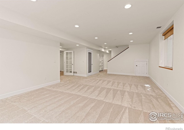 1509 Poplar Ave, Boulder, CO 80304 - finished basement with recessed lighting, light carpet, and stairway