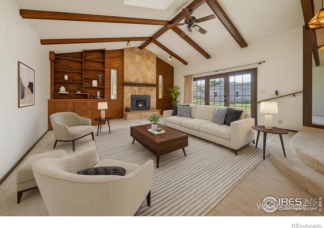 912 Diana St, Fort Morgan, CO 80701 - living room with light colored carpet, a ceiling fan, baseboards, a fireplace, and built in features