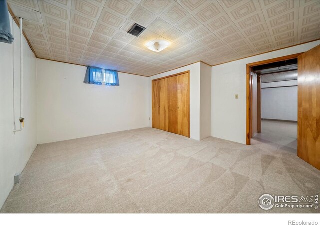 912 Diana St, Fort Morgan, CO 80701 - unfurnished bedroom featuring carpet and a closet
