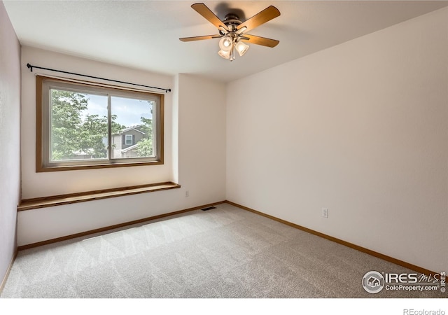 379 E 41st Ct, Loveland, CO 80538 - empty room with light carpet, baseboards, and ceiling fan