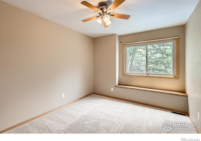 379 E 41st Ct, Loveland, CO 80538 - unfurnished room with carpet floors, baseboards, and ceiling fan