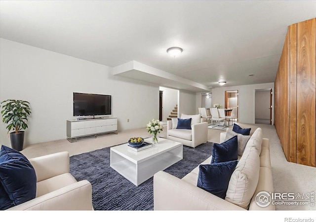 1365 Settlers Dr, Eaton, CO 80615 - carpeted living area featuring stairs