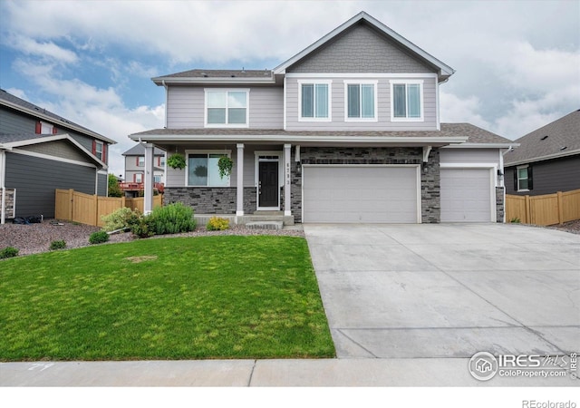 6793 Hayfield St, Wellington, CO 80549 - craftsman inspired home featuring a porch, driveway, a garage, and stone siding