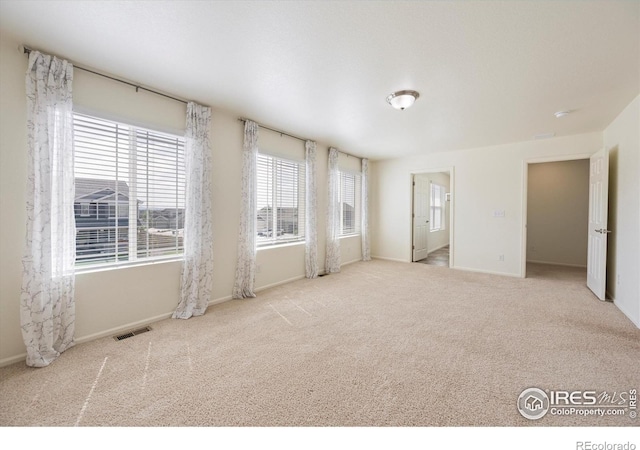 6793 Hayfield St, Wellington, CO 80549 - carpeted empty room featuring baseboards