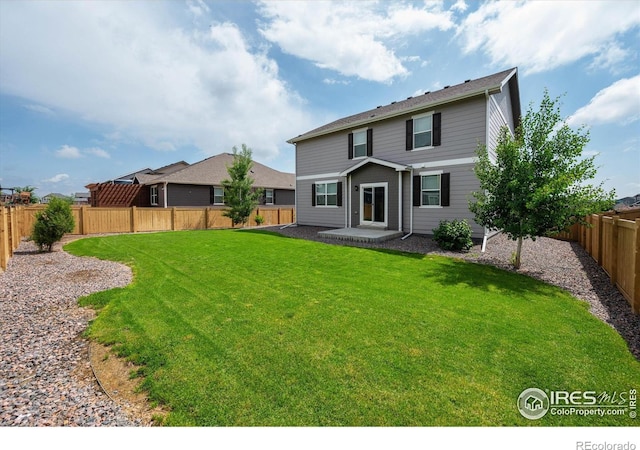 6793 Hayfield St, Wellington, CO 80549 - back of property with a patio area