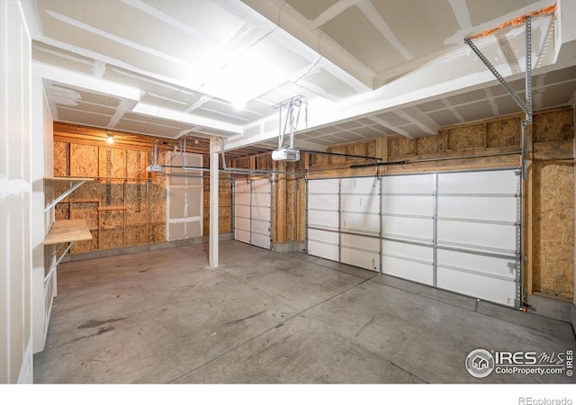 6793 Hayfield St, Wellington, CO 80549 - garage with a garage door opener