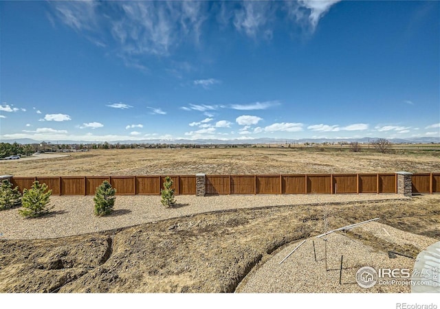 2435 Calais Dr Unit G, Longmont, CO 80504 - view of yard featuring a rural view and a mountain view