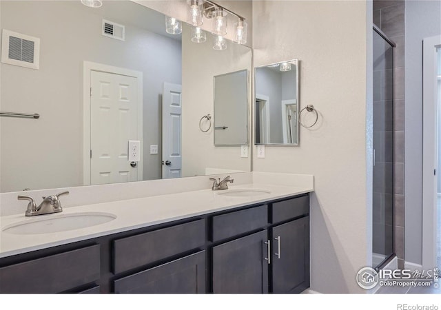 2435 Calais Dr Unit G, Longmont, CO 80504 - bathroom with double vanity and a stall shower