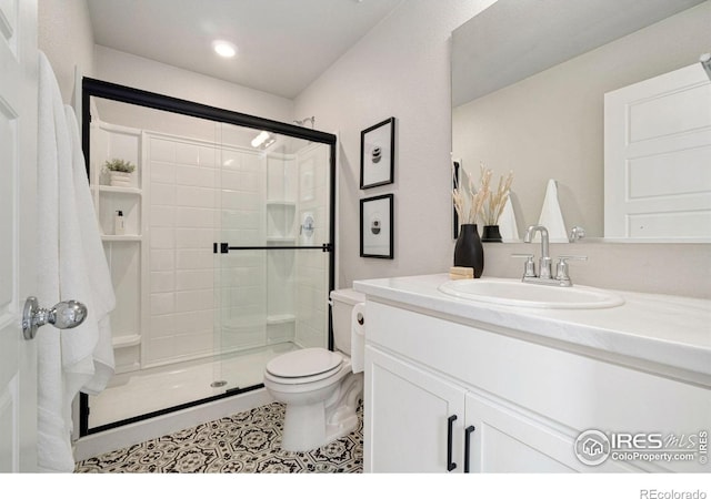 259 Molinar St, Johnstown, CO 80534 - full bathroom with a stall shower, vanity, toilet, and recessed lighting