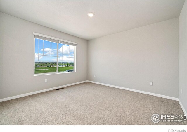 259 Molinar St, Johnstown, CO 80534 - carpeted spare room with baseboards and recessed lighting