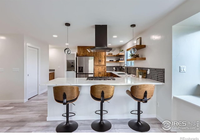 128 Carpenter Rd, Fort Collins, CO 80525 - kitchen featuring island exhaust hood, appliances with stainless steel finishes, open shelves, a sink, and light wood-style floors
