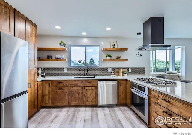128 Carpenter Rd, Fort Collins, CO 80525 - kitchen with stainless steel appliances, open shelves, island exhaust hood, a sink, and recessed lighting