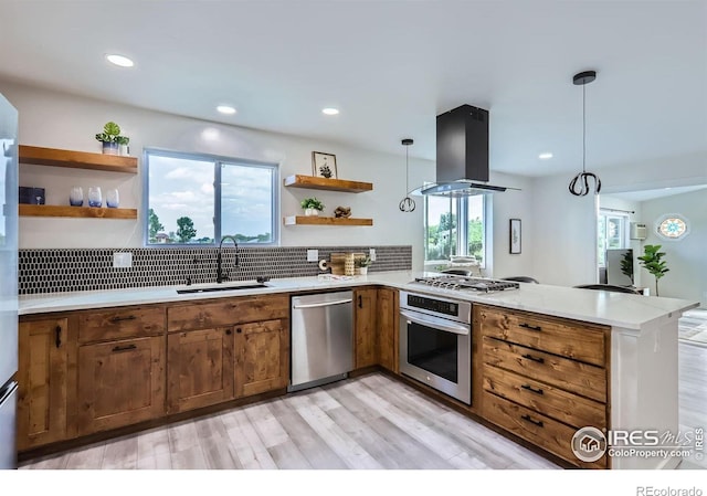 128 Carpenter Rd, Fort Collins, CO 80525 - kitchen with appliances with stainless steel finishes, open shelves, island exhaust hood, a sink, and a peninsula