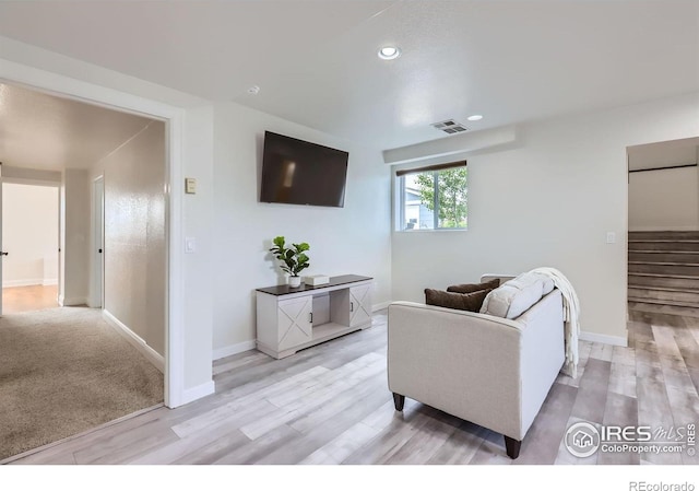 128 Carpenter Rd, Fort Collins, CO 80525 - living area featuring light wood-type flooring, stairway, baseboards, and recessed lighting