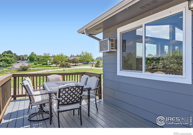 128 Carpenter Rd, Fort Collins, CO 80525 - wooden deck featuring outdoor dining space