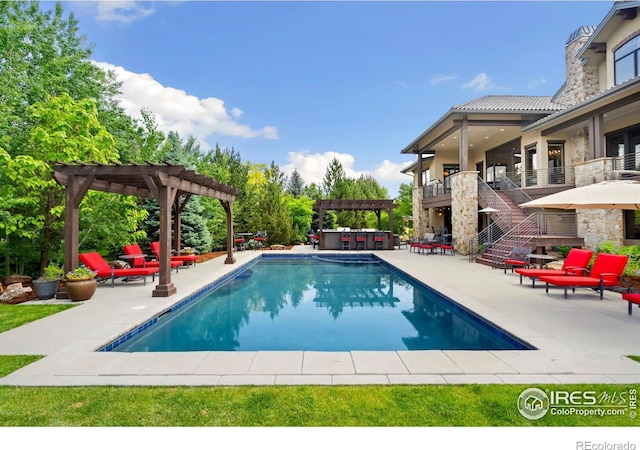 5709 Old Legacy Dr, Fort Collins, CO 80528 - outdoor pool featuring a pergola and a patio area