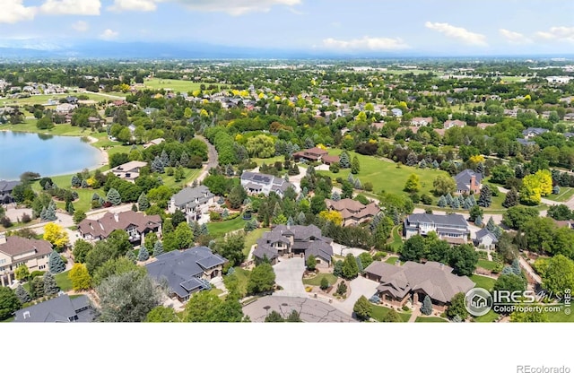 5709 Old Legacy Dr, Fort Collins, CO 80528 - aerial perspective of suburban area with a nearby body of water