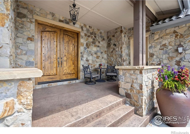 5709 Old Legacy Dr, Fort Collins, CO 80528 - property entrance featuring covered porch