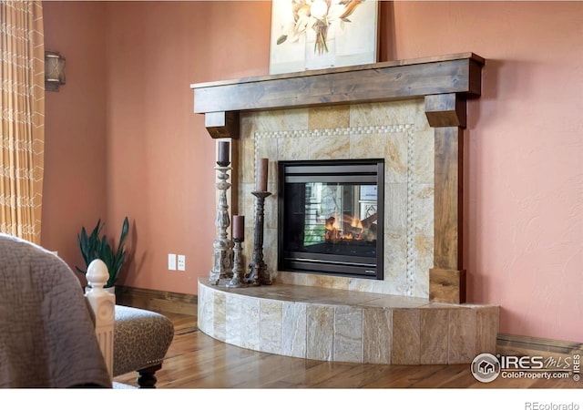 5709 Old Legacy Dr, Fort Collins, CO 80528 - detailed view of a fireplace and wood finished floors