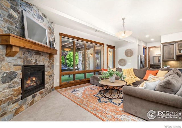5709 Old Legacy Dr, Fort Collins, CO 80528 - carpeted living room featuring a fireplace and recessed lighting