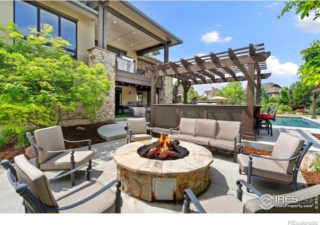 5709 Old Legacy Dr, Fort Collins, CO 80528 - patio / terrace featuring a patio, an outdoor pool, an outdoor living space with a fire pit, and a pergola