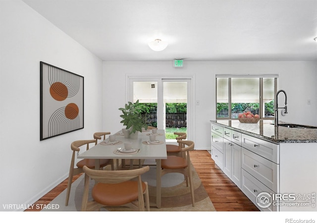 4462 Hamilton Ct, Boulder, CO 80305 - dining space featuring wood finished floors and baseboards