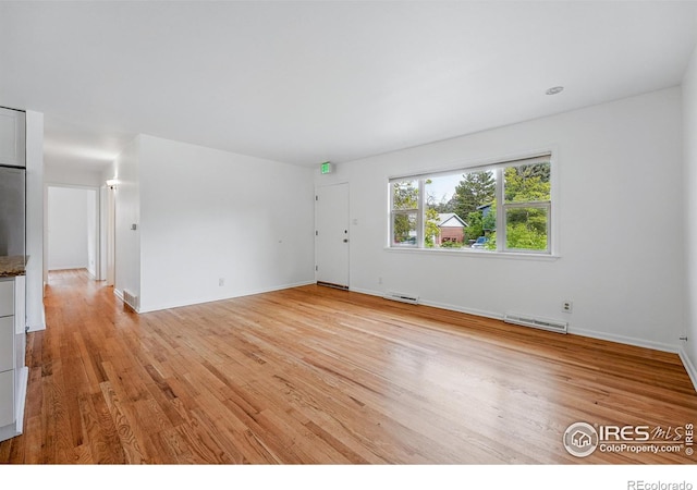4462 Hamilton Ct, Boulder, CO 80305 - spare room with light wood-style floors and baseboards
