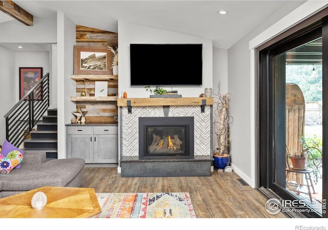 365 Mohawk Dr, Boulder, CO 80303 - living area featuring wood finished floors, stairway, a tile fireplace, recessed lighting, and baseboards