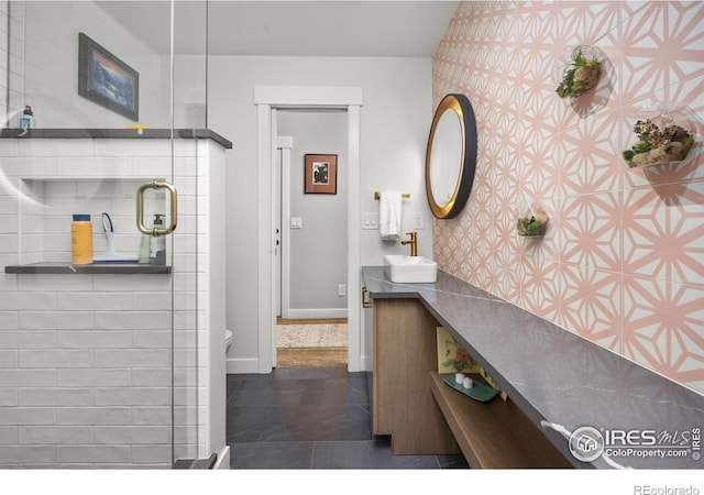 365 Mohawk Dr, Boulder, CO 80303 - full bath featuring vanity, toilet, a stall shower, baseboards, and wallpapered walls