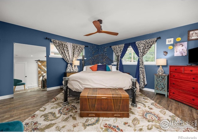 365 Mohawk Dr, Boulder, CO 80303 - bedroom featuring wood finished floors, baseboards, and ceiling fan