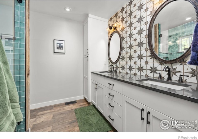 365 Mohawk Dr, Boulder, CO 80303 - full bath with wood finished floors, recessed lighting, baseboards, and double vanity