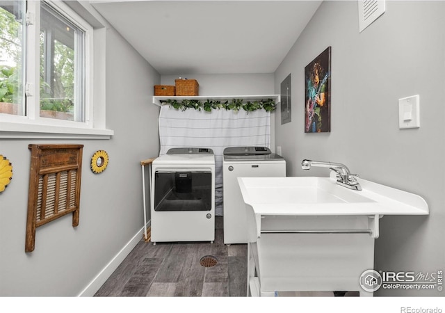 365 Mohawk Dr, Boulder, CO 80303 - laundry room with washer and dryer, dark wood-style floors, and baseboards