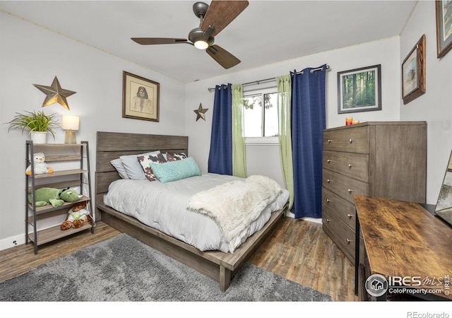 365 Mohawk Dr, Boulder, CO 80303 - bedroom featuring wood finished floors, ceiling fan, and baseboards