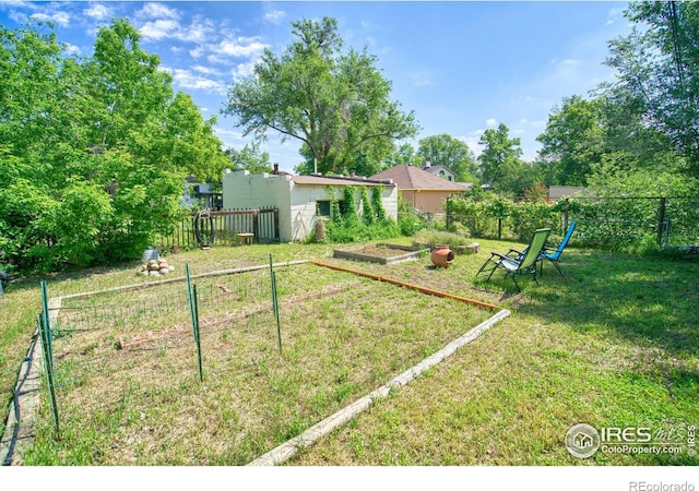 1233 Carolina Ave, Longmont, CO 80501 - view of yard with a garden