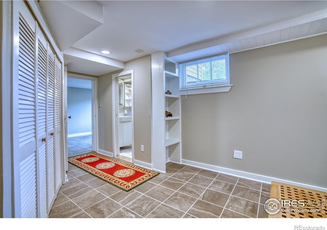 1233 Carolina Ave, Longmont, CO 80501 - foyer featuring tile patterned flooring and recessed lighting