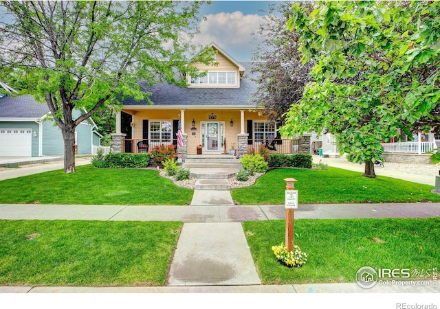 1421 Canal Dr, Windsor, CO 80550 - view of front facade with covered porch and a front yard