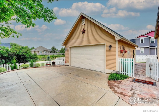 1421 Canal Dr, Windsor, CO 80550 - view of front facade featuring an outbuilding and a detached garage