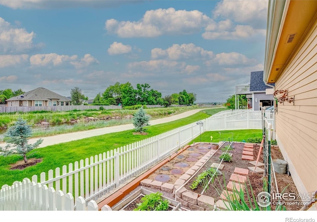 1421 Canal Dr, Windsor, CO 80550 - view of yard featuring a vegetable garden