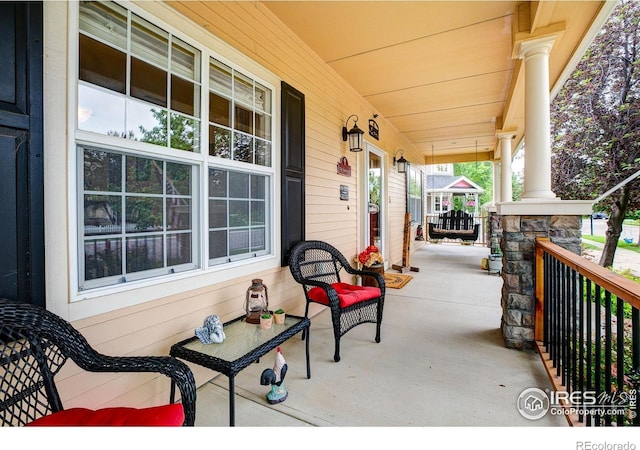 1421 Canal Dr, Windsor, CO 80550 - view of covered porch