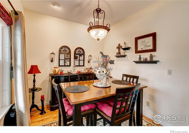 1421 Canal Dr, Windsor, CO 80550 - dining area with wood finished floors and baseboards