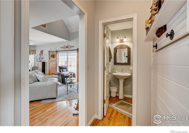 1421 Canal Dr, Windsor, CO 80550 - corridor with light wood-style floors and baseboards