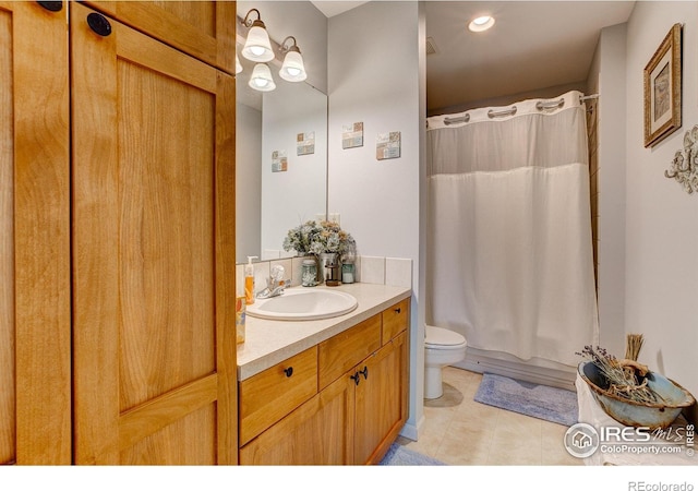 1421 Canal Dr, Windsor, CO 80550 - bathroom with vanity, toilet, tile patterned flooring, and shower / bath combo