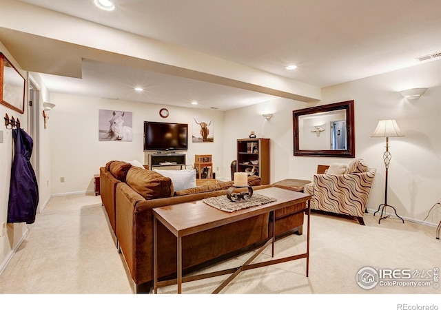 1421 Canal Dr, Windsor, CO 80550 - living area featuring light carpet, recessed lighting, and baseboards